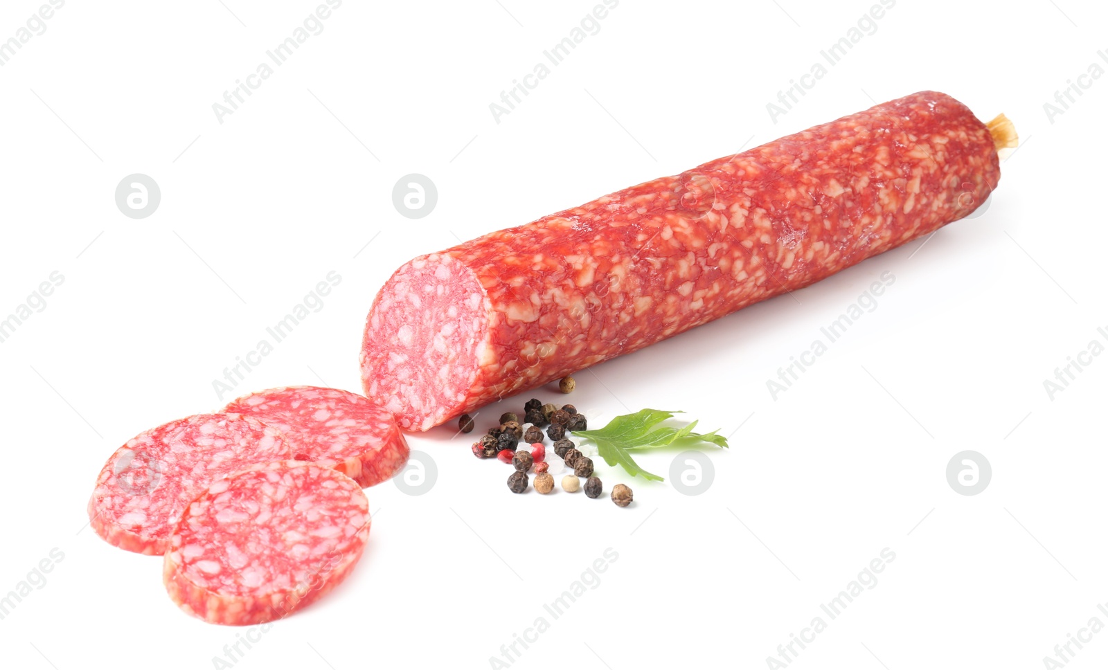 Photo of Delicious dry cured sausage and spices isolated on white