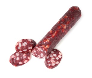 Photo of Delicious dry cured sausage isolated on white, top view