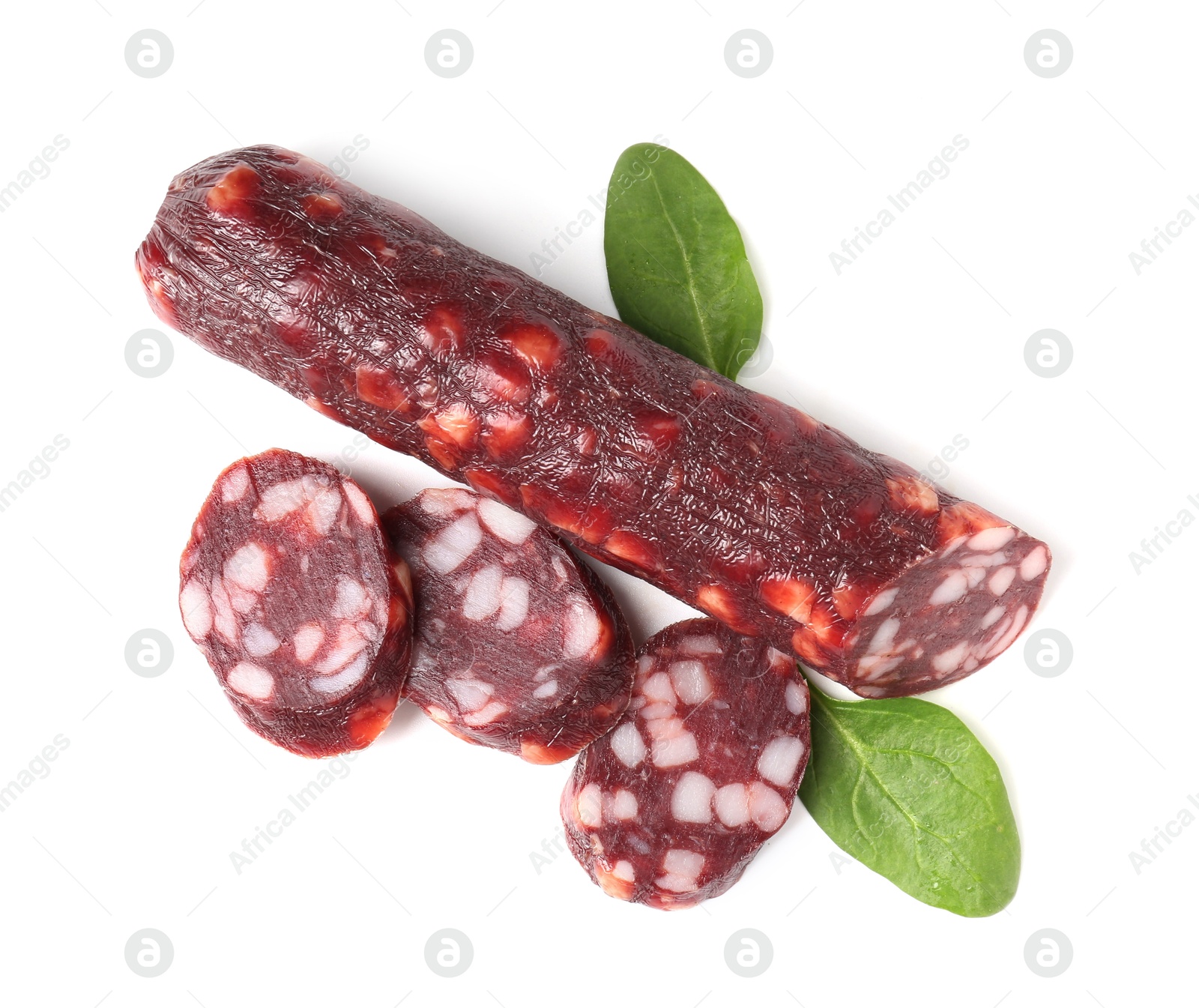 Photo of Delicious dry cured sausage and spinach isolated on white, top view