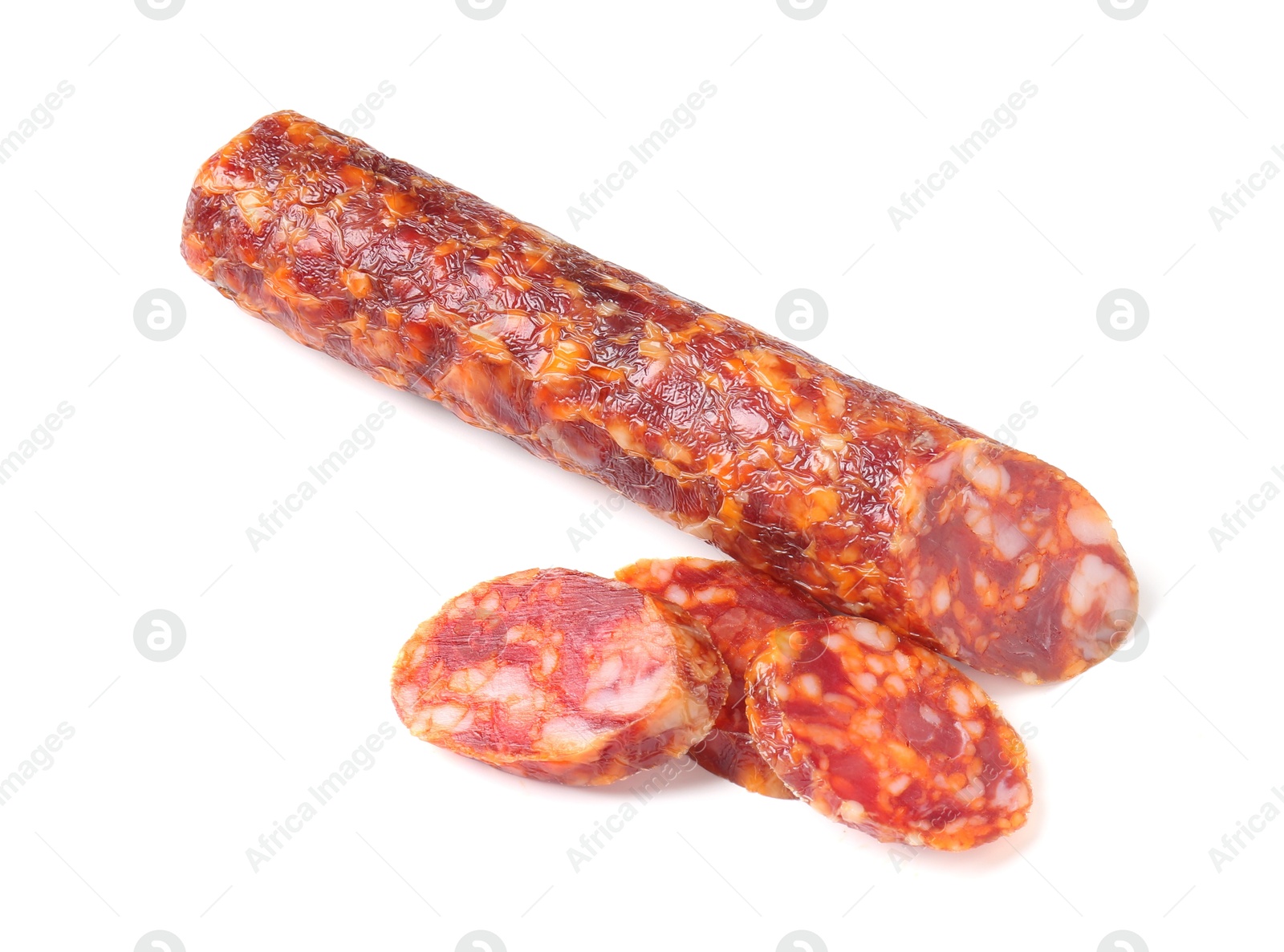 Photo of Delicious dry cured sausage isolated on white, top view