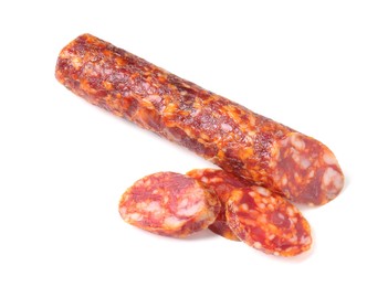 Photo of Delicious dry cured sausage isolated on white, top view