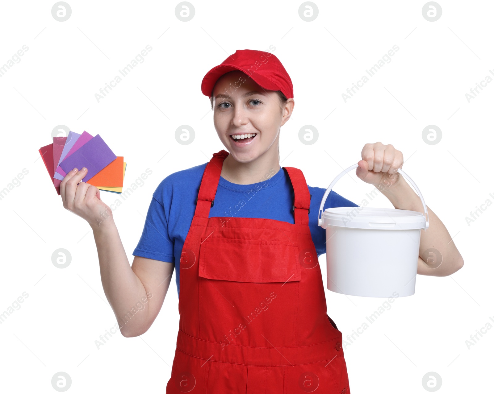 Photo of Professional painter with color samples and bucket of paint on white background