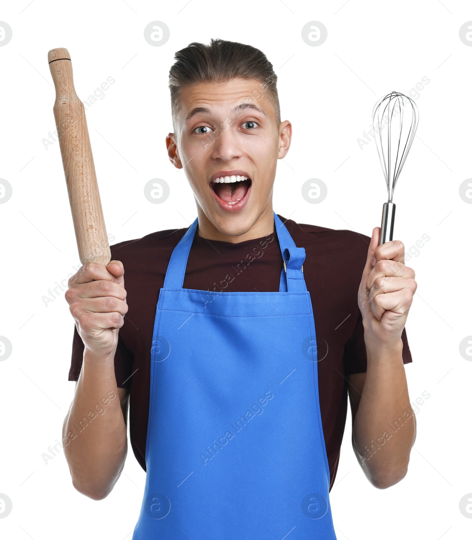 Photo of Excited man with rolling pin and whisk on white background