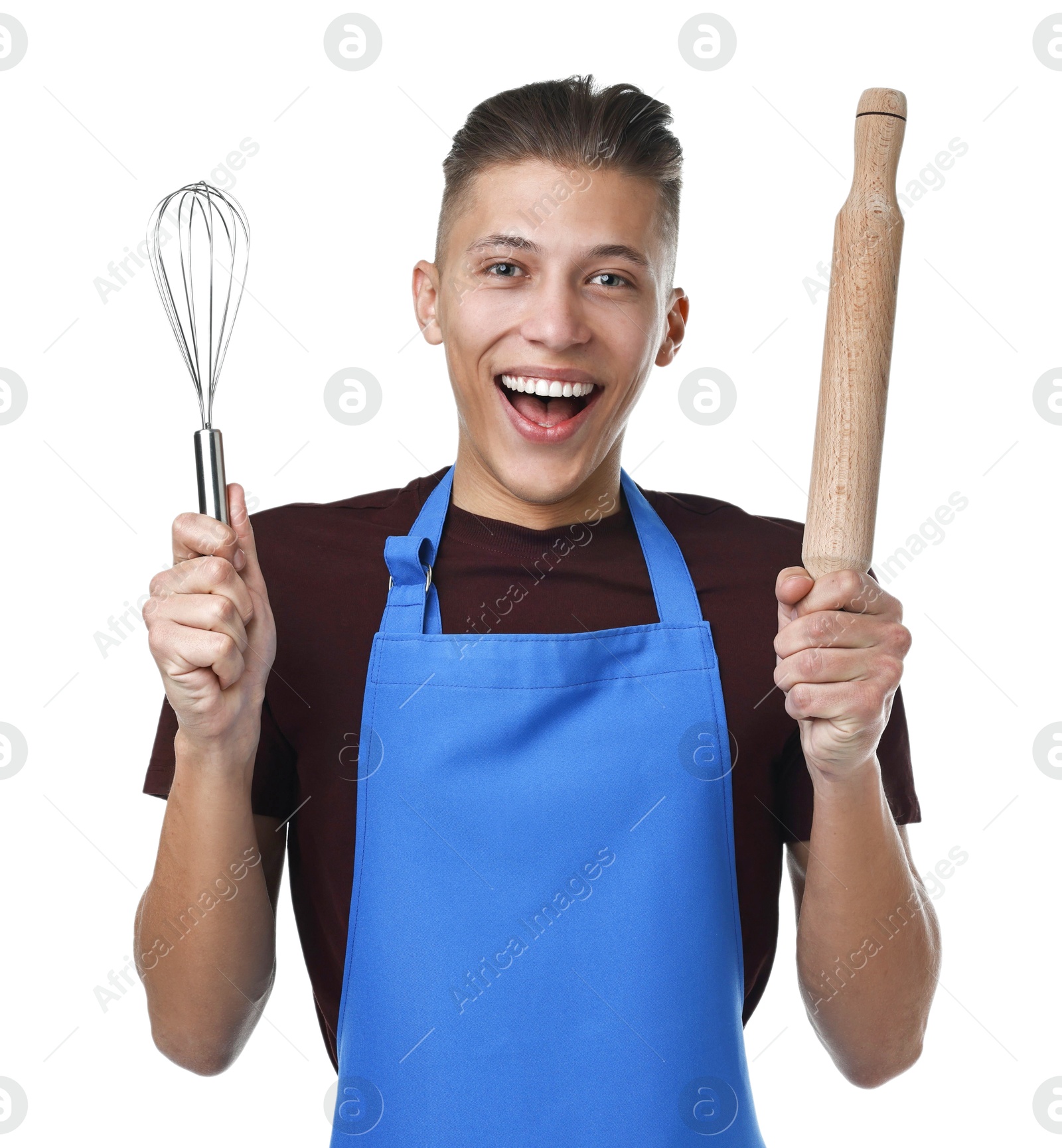 Photo of Happy man with rolling pin and whisk on white background