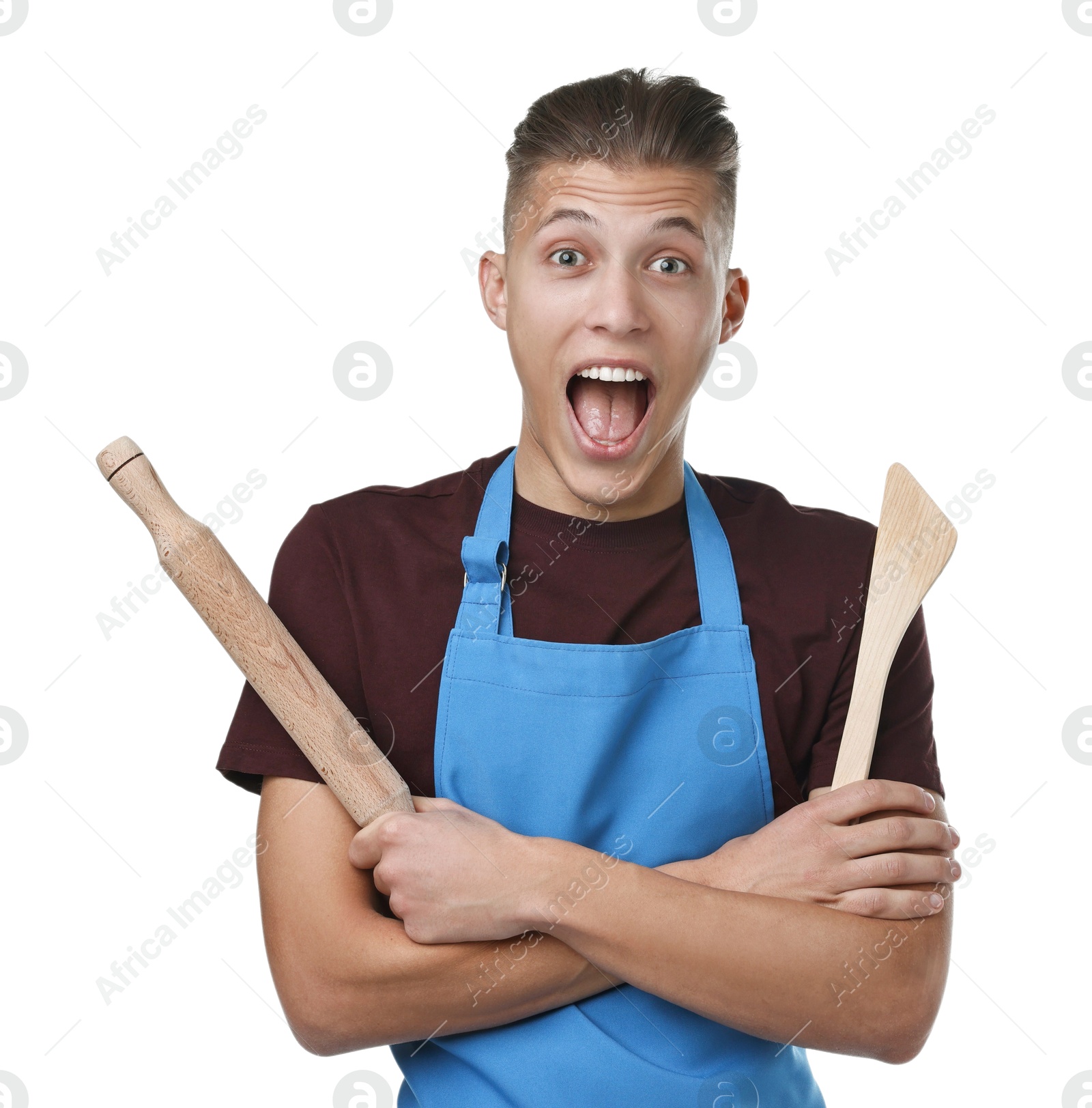 Photo of Excited man with rolling pin and turner on white background