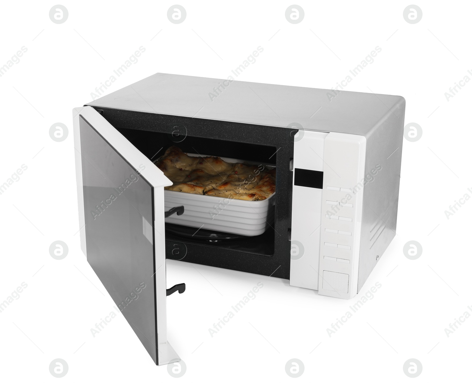 Photo of Open microwave oven with tasty lasagna isolated on white