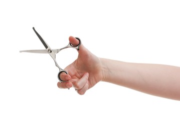 Photo of Woman with scissors for pet grooming on white background, closeup