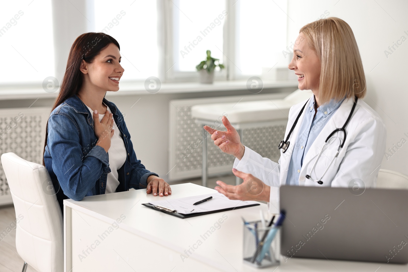 Photo of Woman having appointment with doctor in hospital