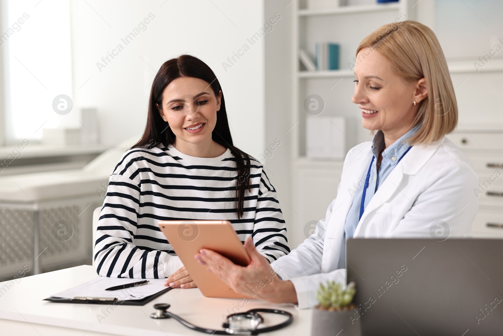 Photo of Woman having appointment with doctor in hospital