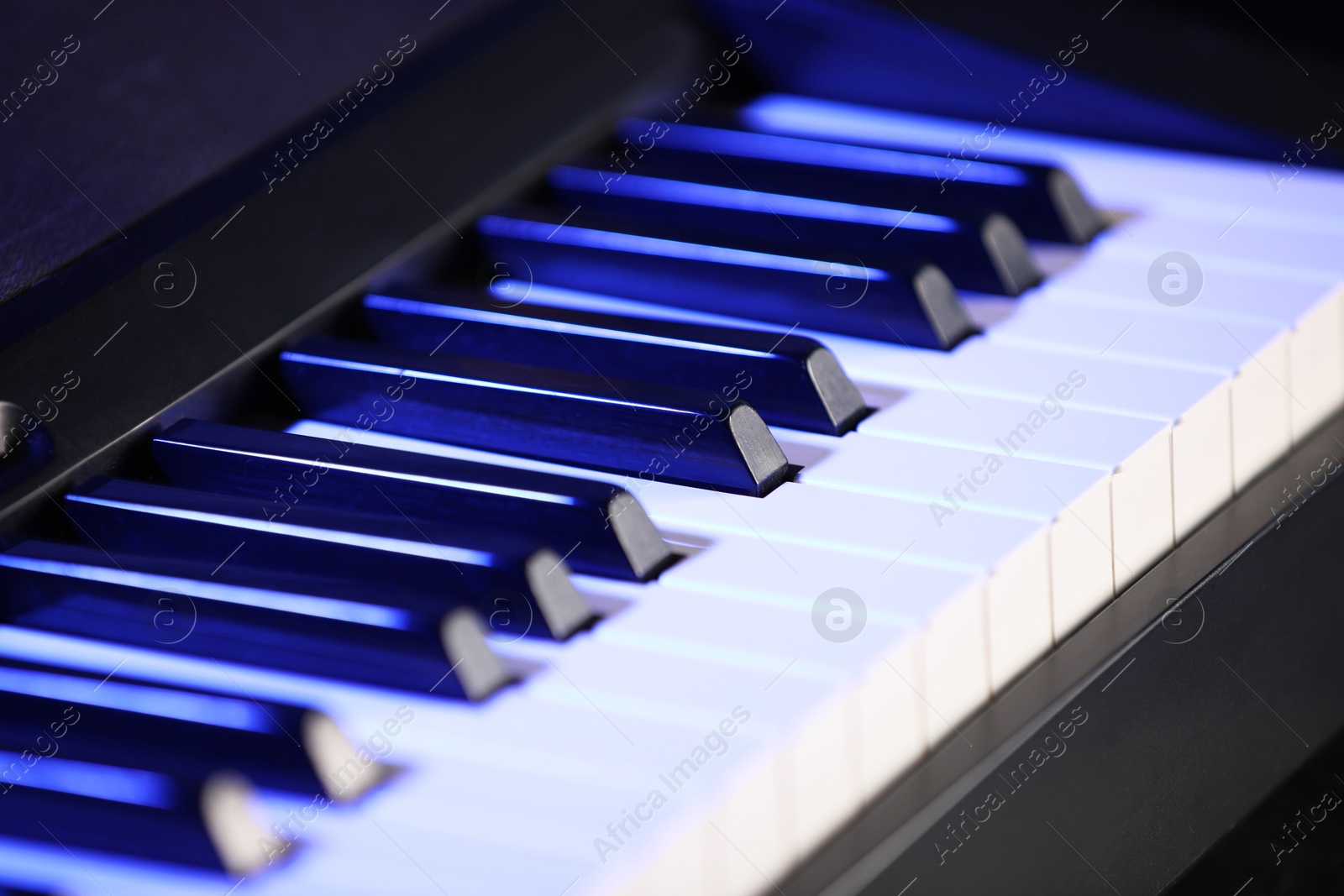 Photo of Beautiful piano as background, closeup view. Festive music