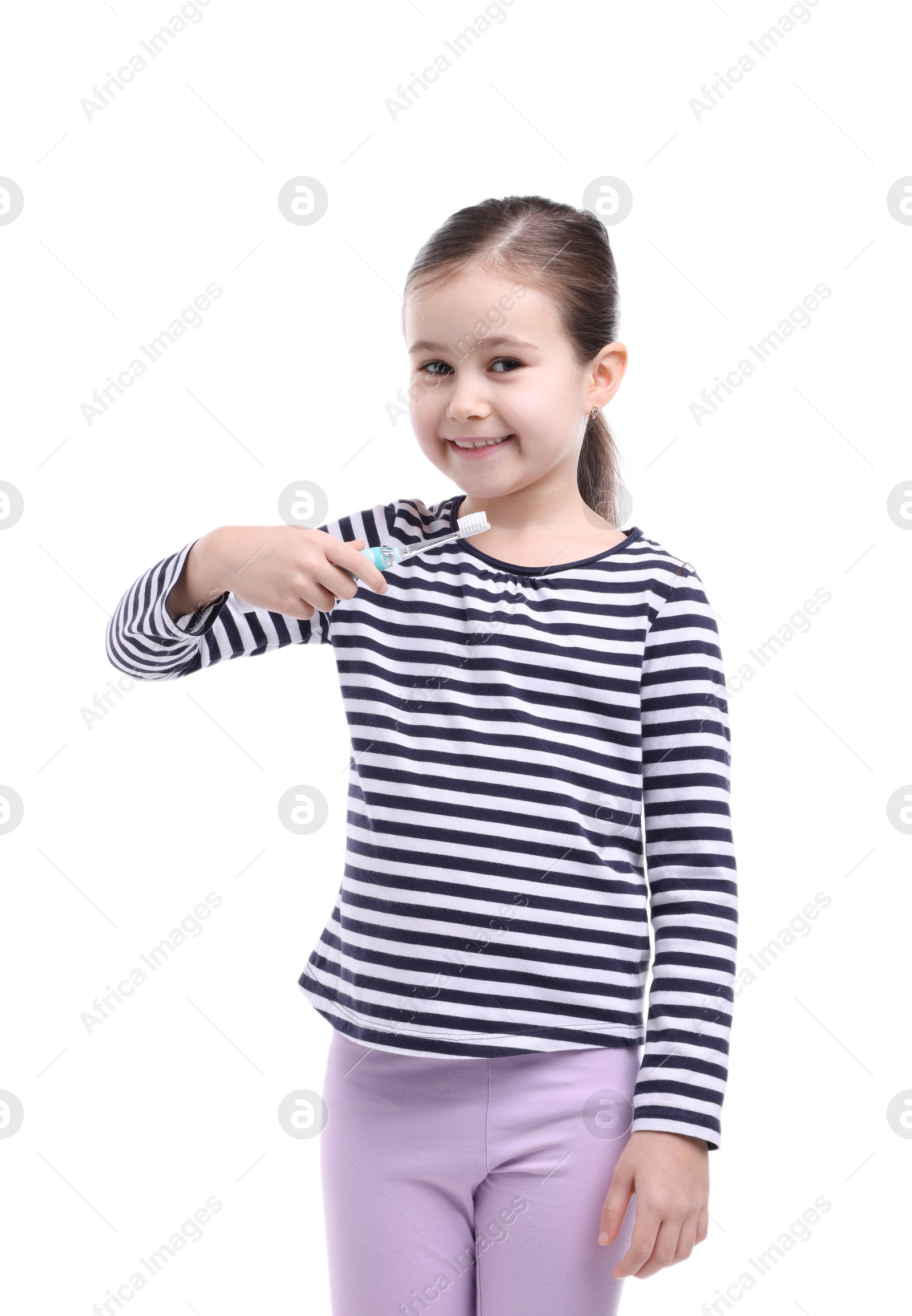 Photo of Cute girl with toothbrush on white background