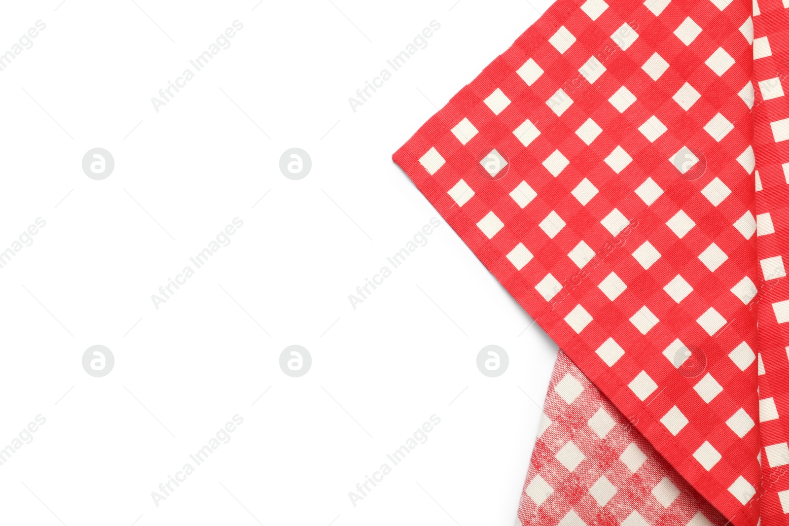 Photo of Red checkered tablecloth isolated on white, top view