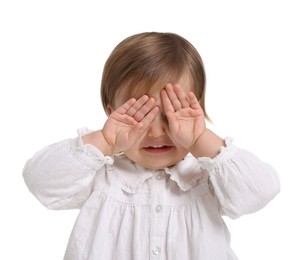 Photo of Cute little baby girl playing peekaboo on white background