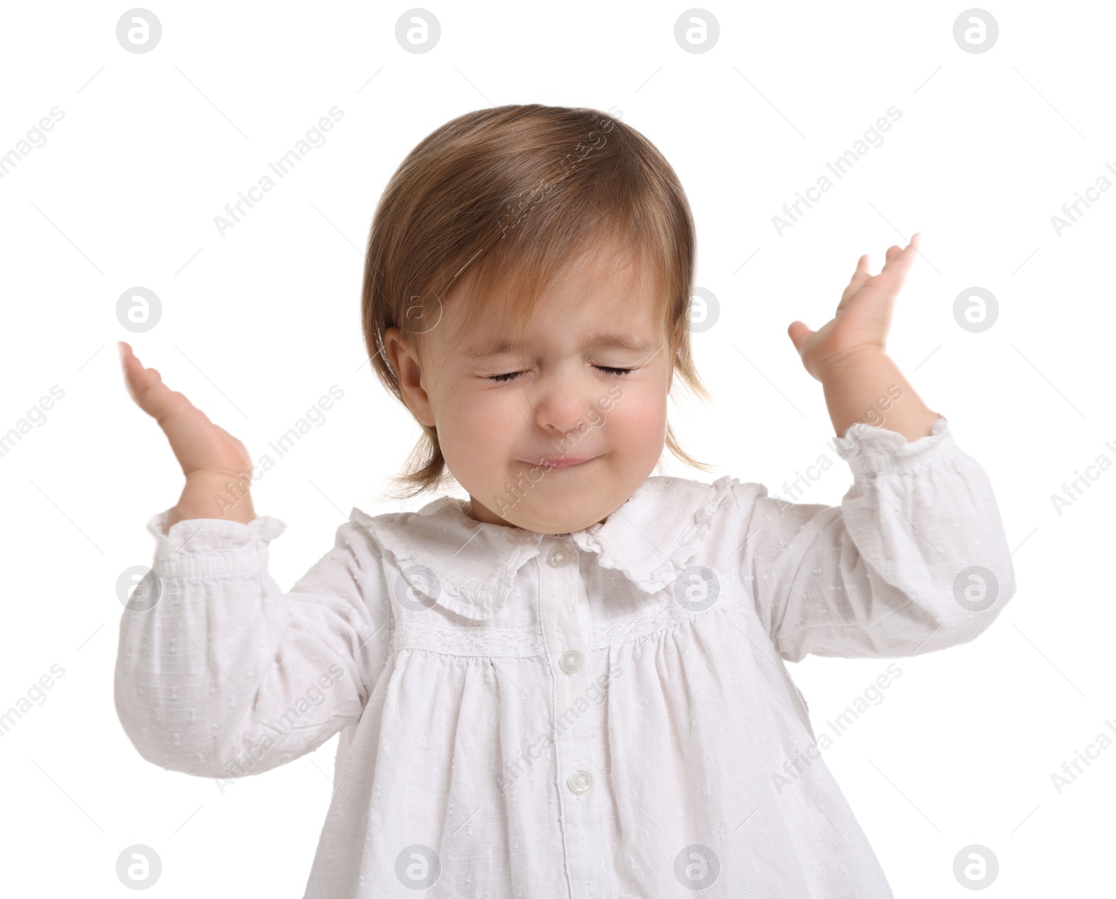 Photo of Cute little baby girl playing peekaboo on white background