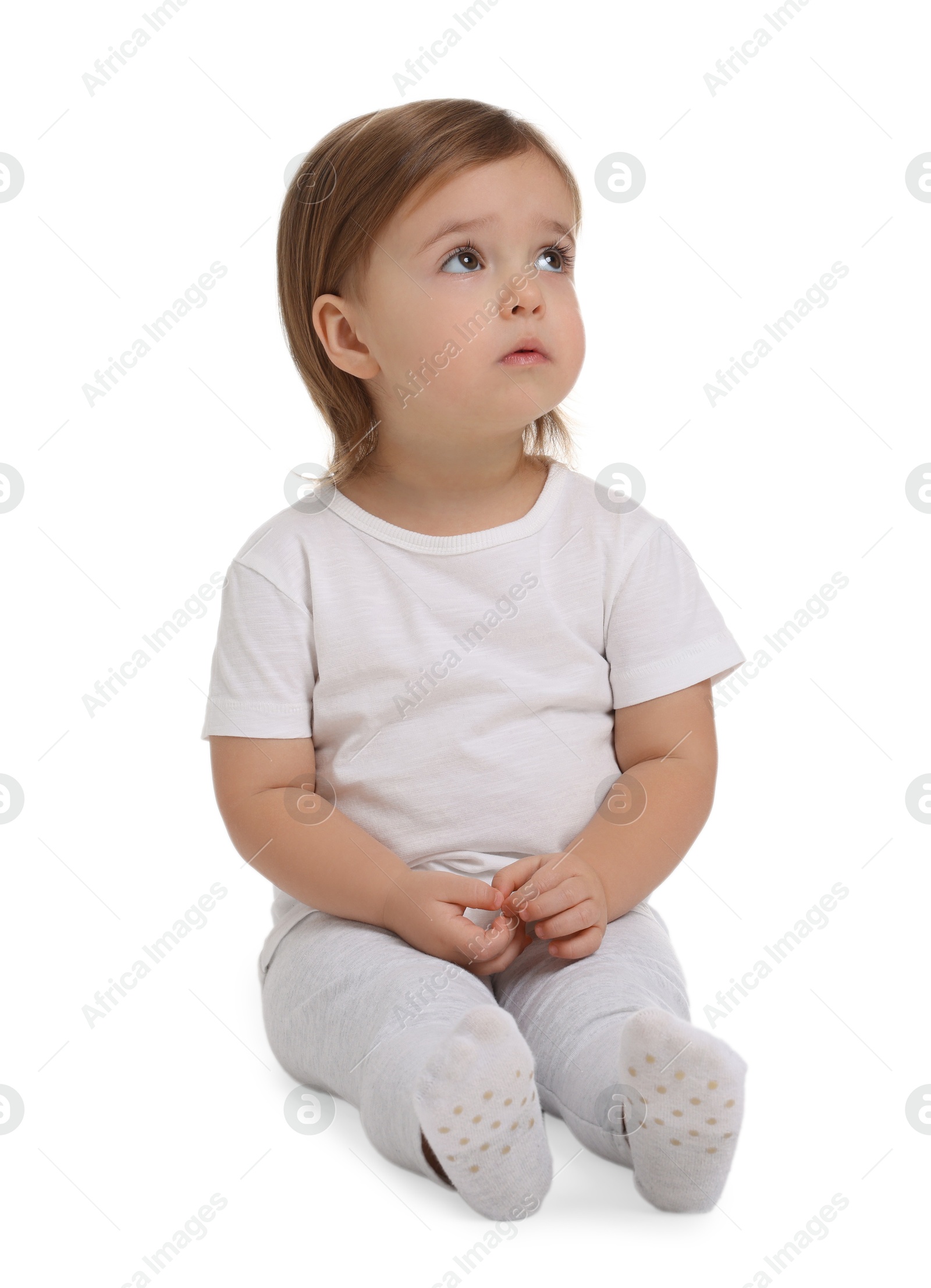 Photo of Cute little baby girl on white background