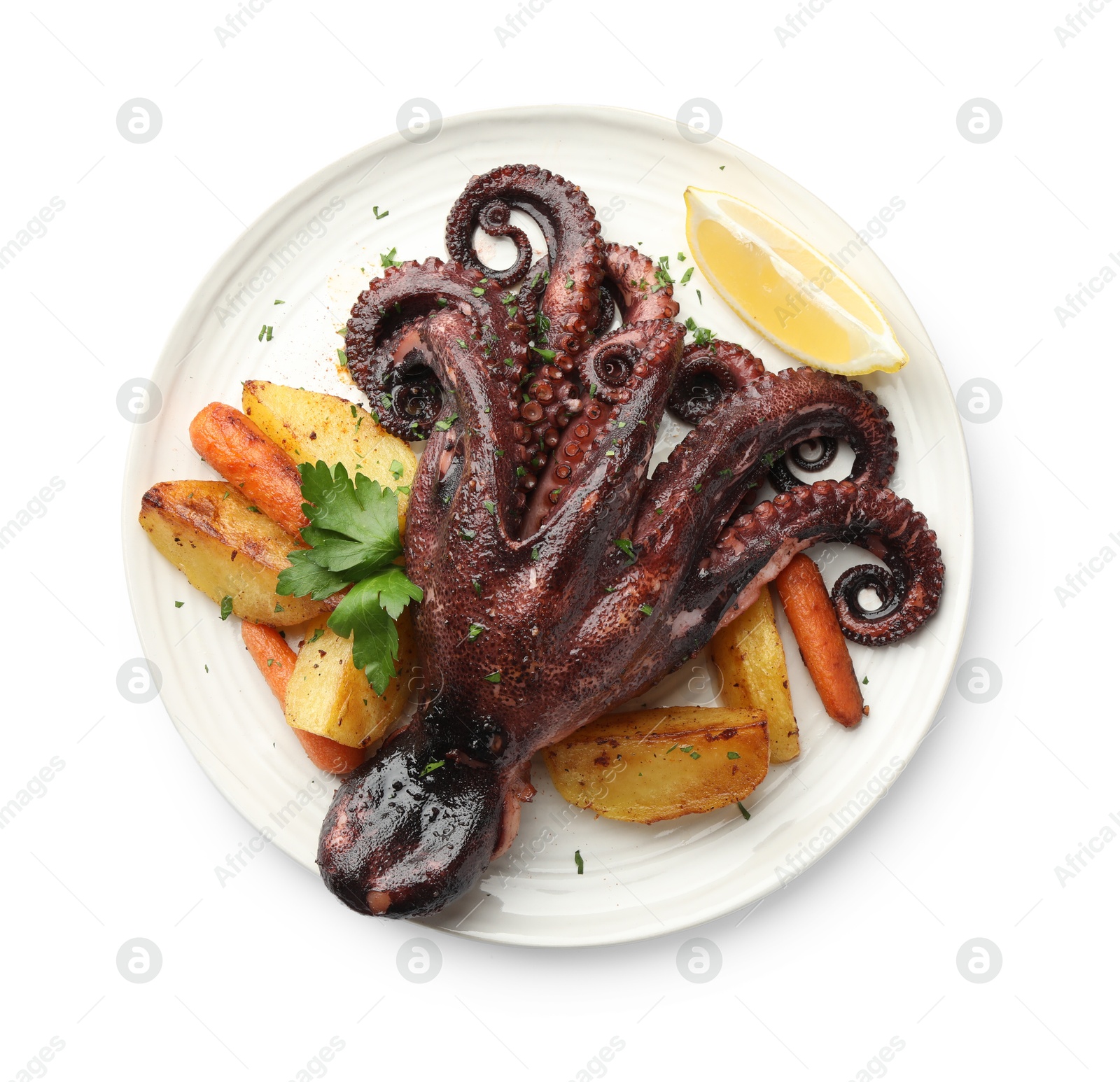 Photo of Roasted octopus with vegetables and lemon isolated on white, top view