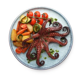 Photo of Fried octopus with herb sauce and vegetables isolated on white, top view