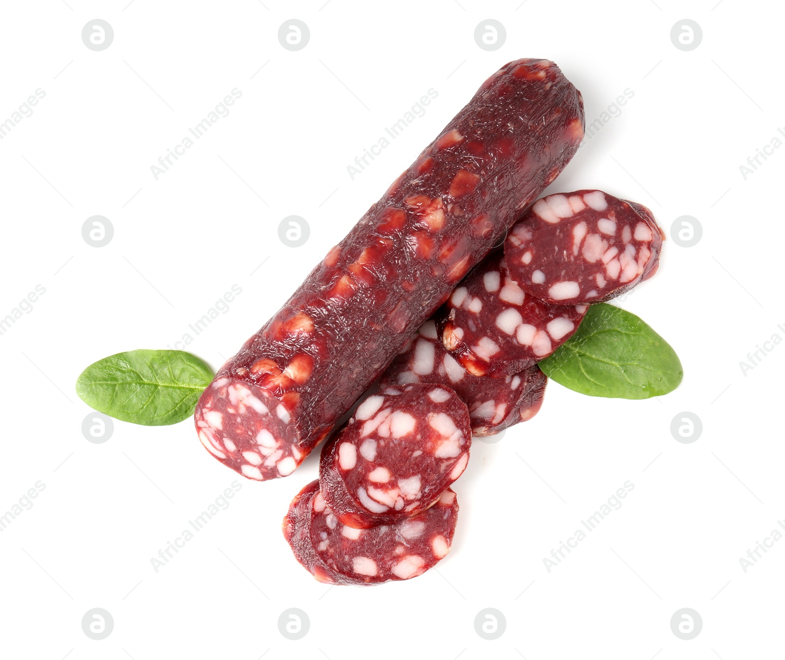 Photo of Delicious dry cured sausage and spinach isolated on white, top view