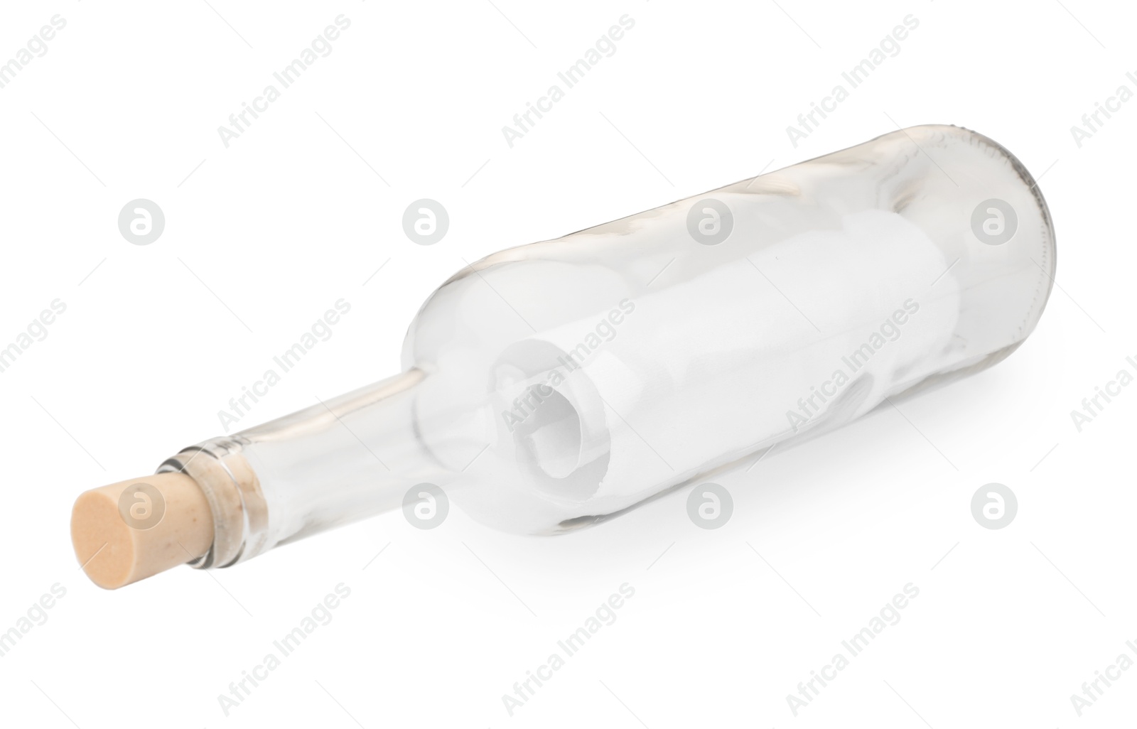 Photo of Corked glass bottle with rolled letter in air isolated on white