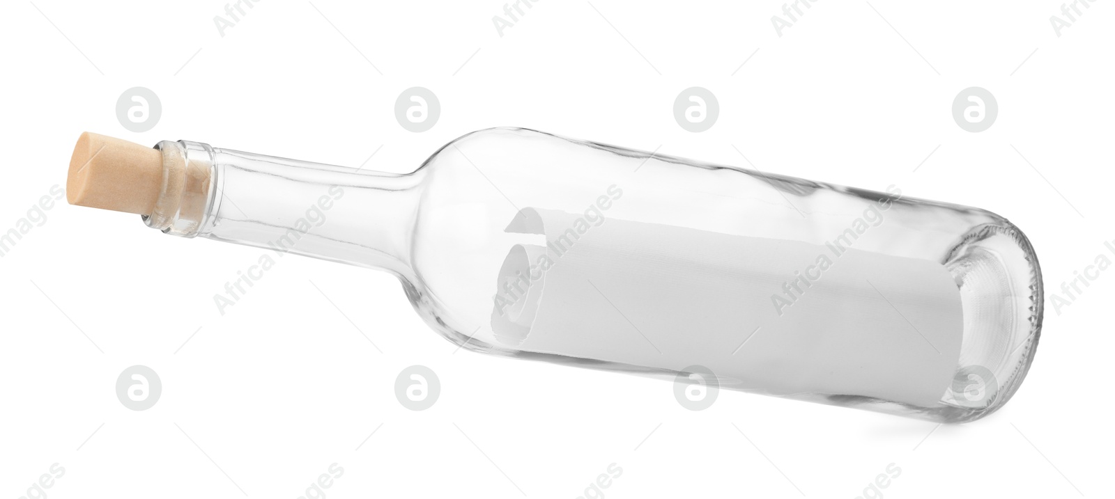 Photo of Corked glass bottle with rolled letter in air isolated on white