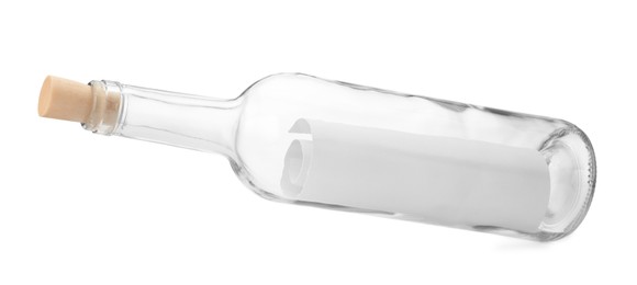 Photo of Corked glass bottle with rolled letter in air isolated on white