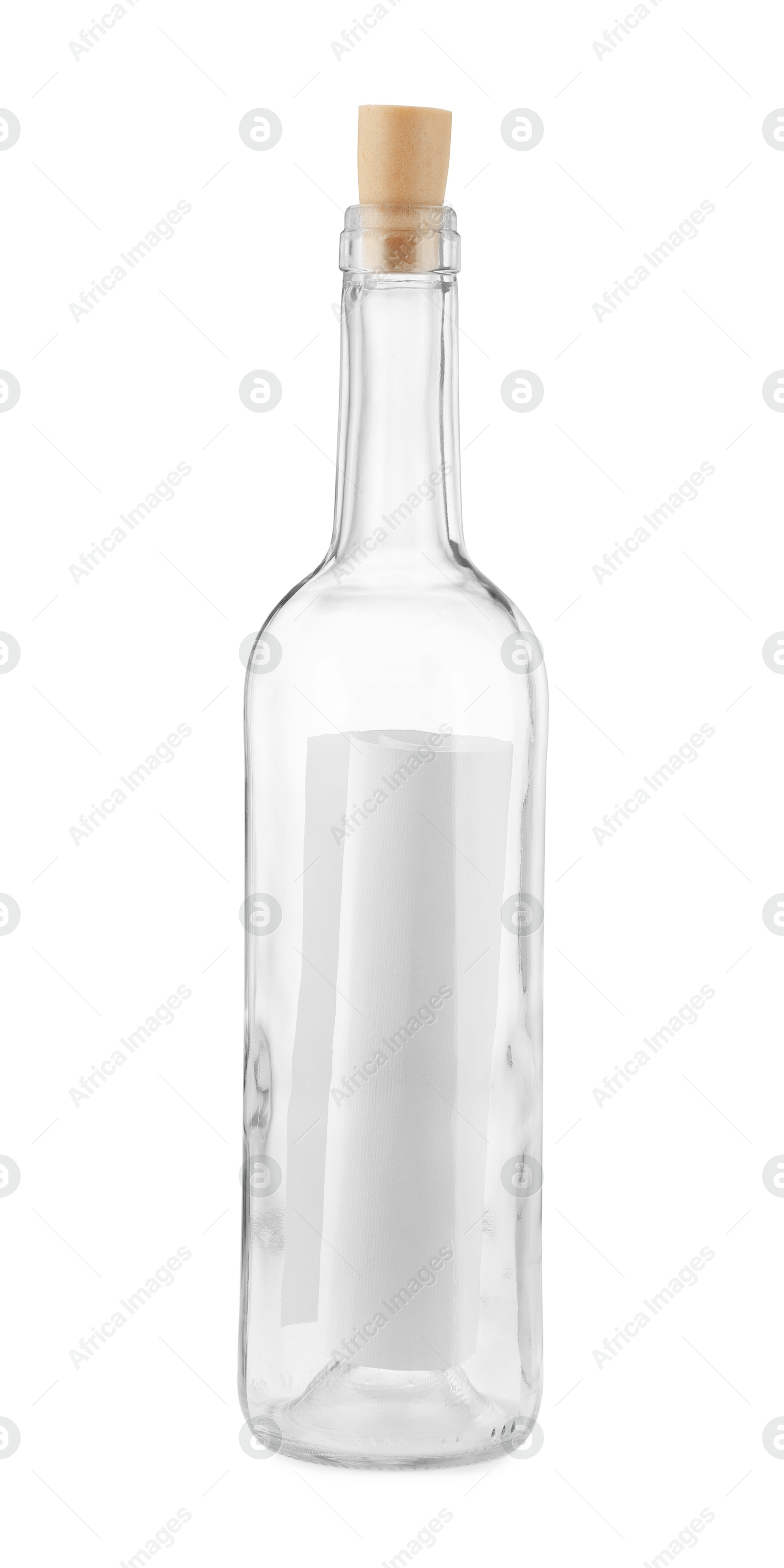 Photo of Corked glass bottle with rolled letter isolated on white