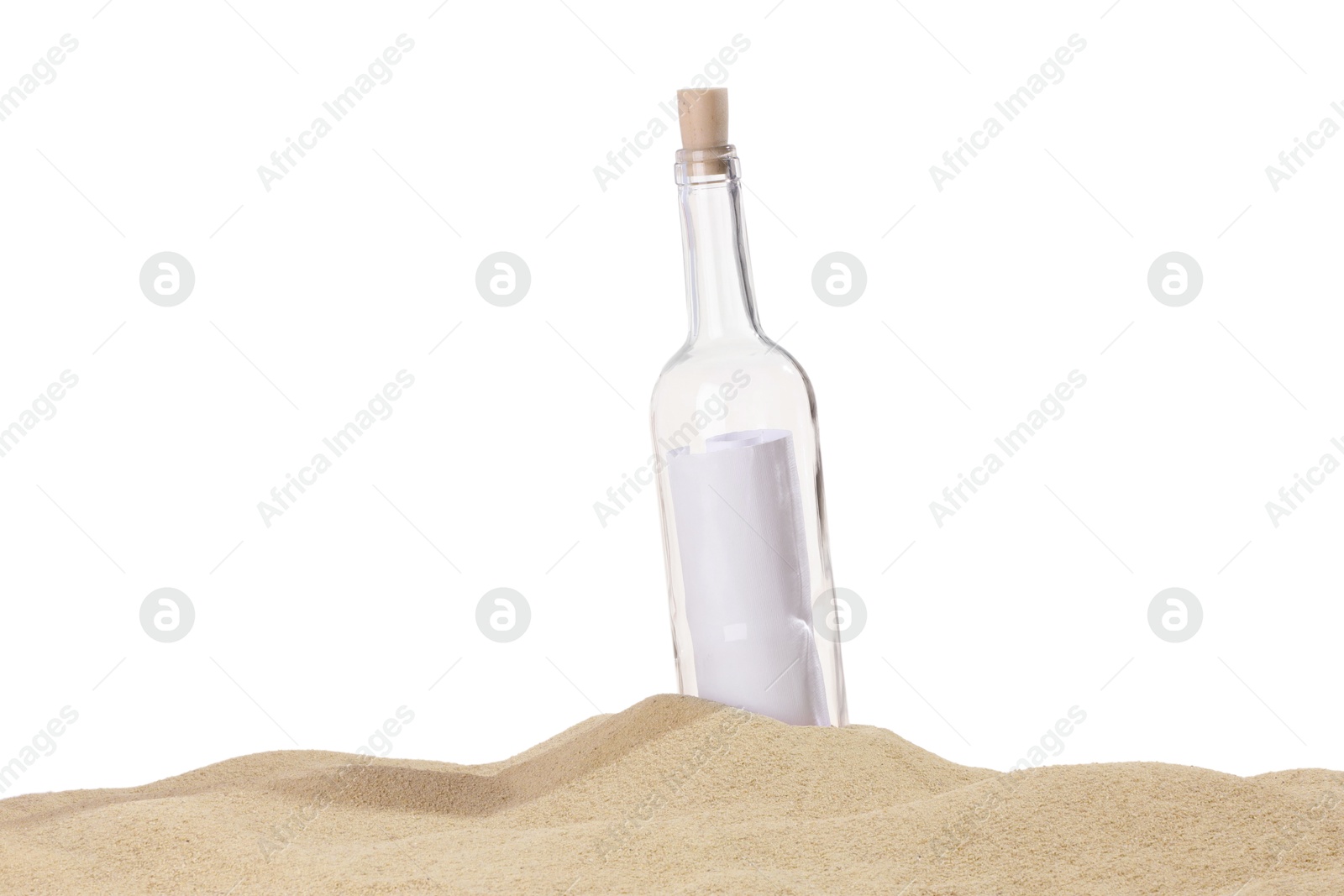 Photo of Rolled letter in corked glass bottle on sand against white background