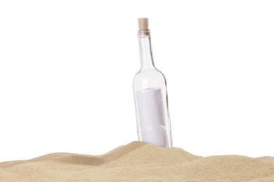 Photo of Rolled letter in corked glass bottle on sand against white background