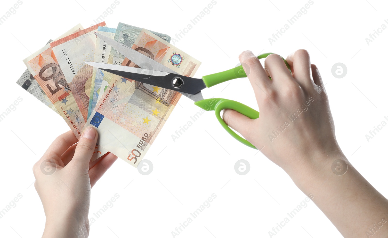 Photo of Woman cutting euro banknotes on white background, closeup