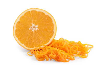 Photo of Pile of fresh orange zest and cut fruit isolated on white