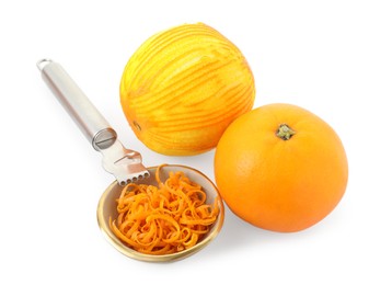 Photo of Fresh orange zest in bowl, fruits and zester isolated on white