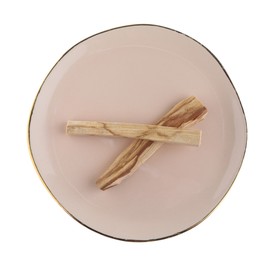 Photo of Palo santo sticks on white background, top view