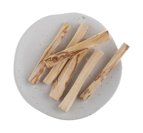 Photo of Palo santo sticks on white background, top view