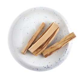 Photo of Palo santo sticks on white background, top view