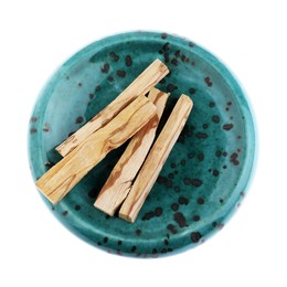 Photo of Palo santo sticks on white background, top view