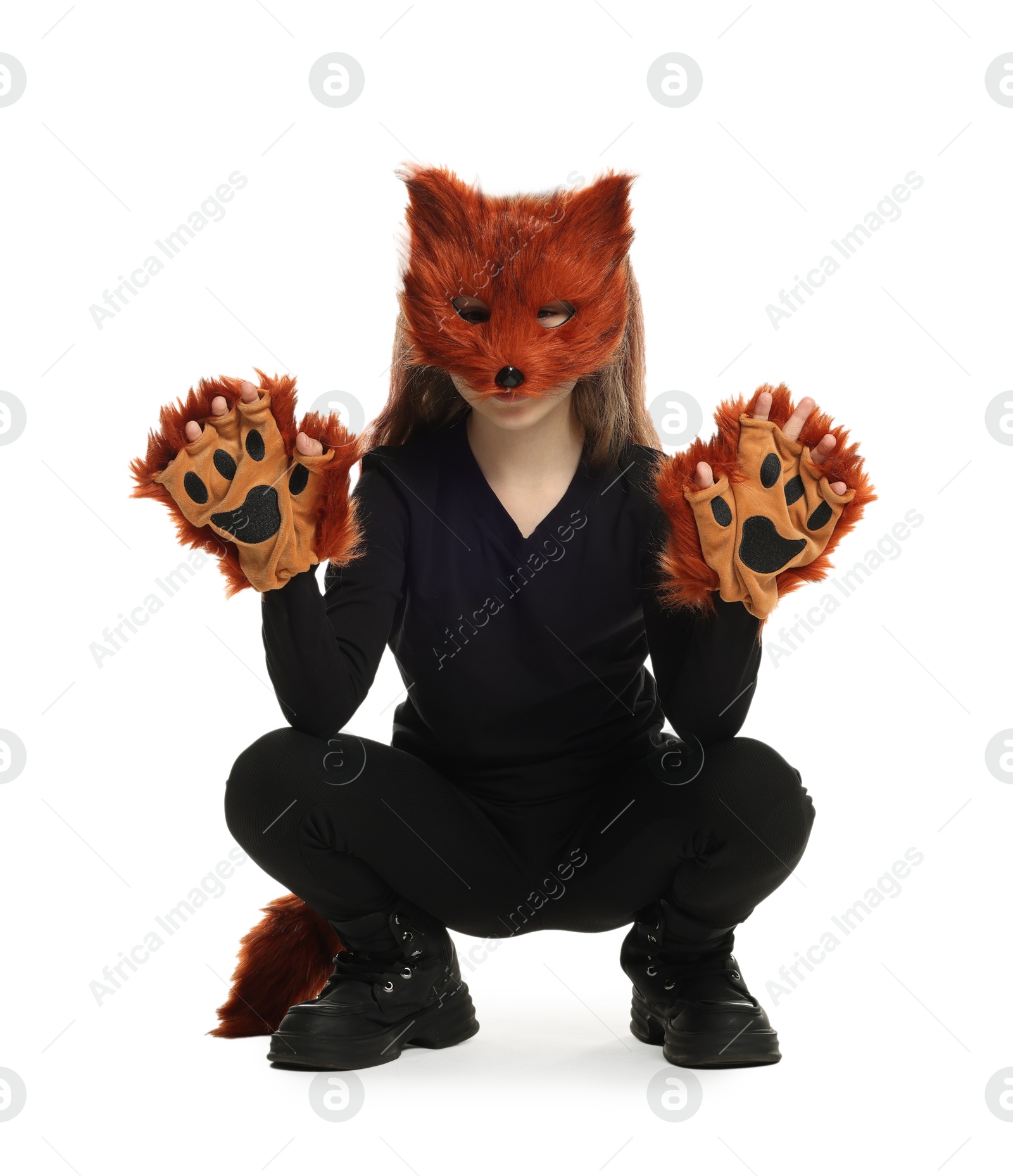 Photo of Quadrobics. Girl wearing fox mask, tail and gloves on white background