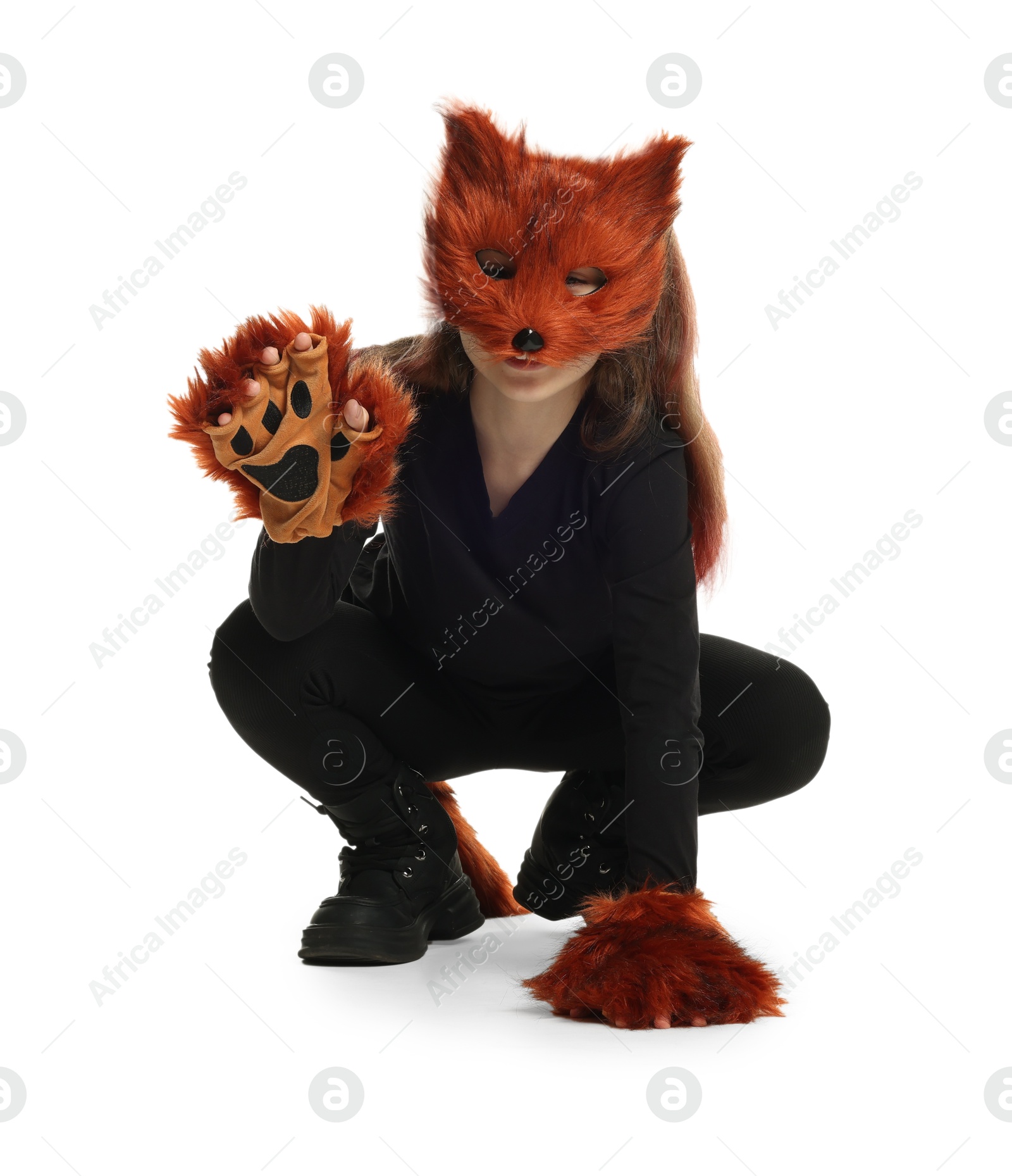 Photo of Quadrobics. Girl wearing fox mask, tail and gloves on white background