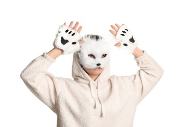 Photo of Quadrobics. Woman wearing cat mask and gloves on white background