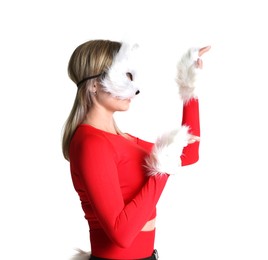 Photo of Quadrobics. Woman wearing cat mask and gloves on white background