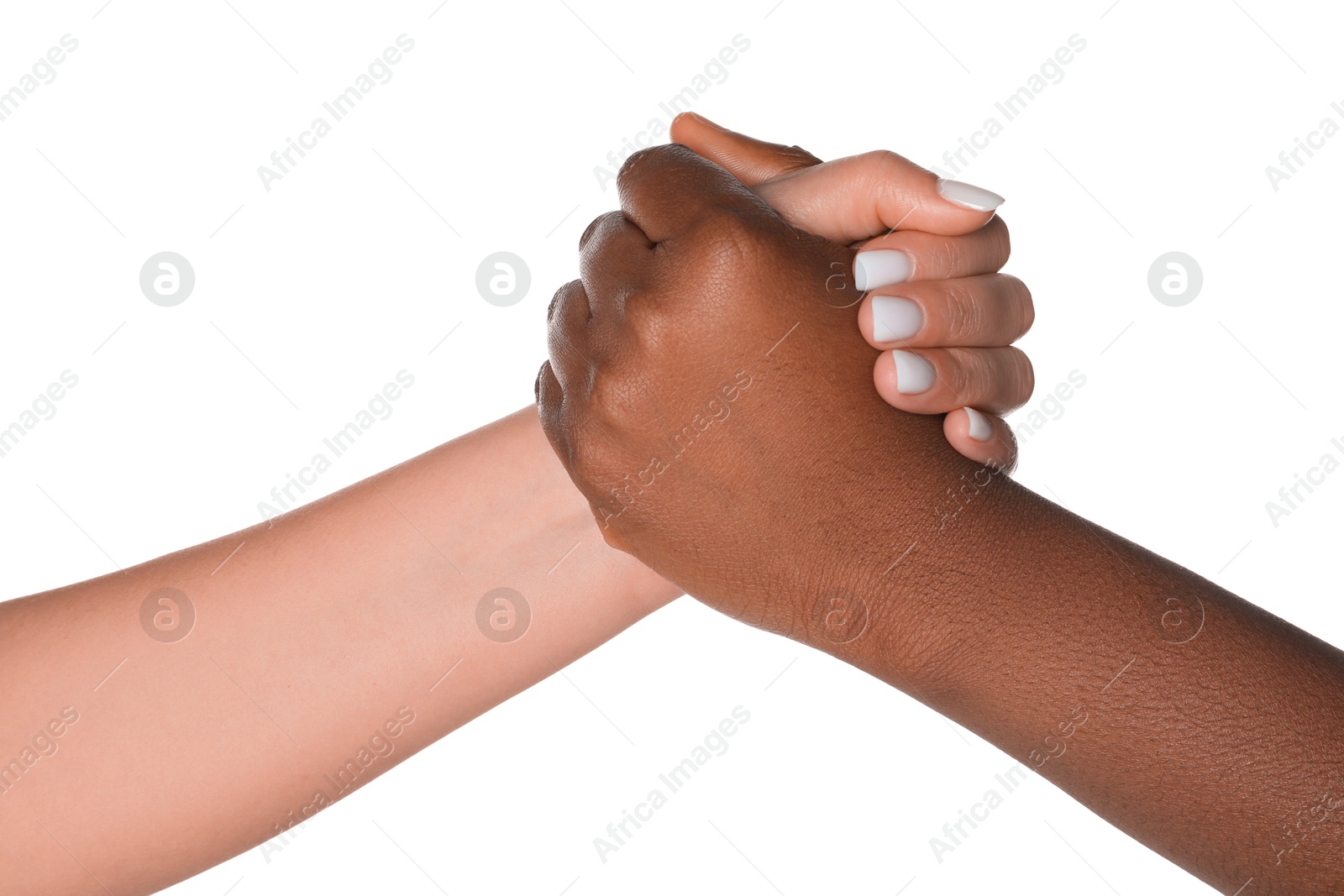 Photo of Stop racism. People of different skin colors holding hands on white background, closeup