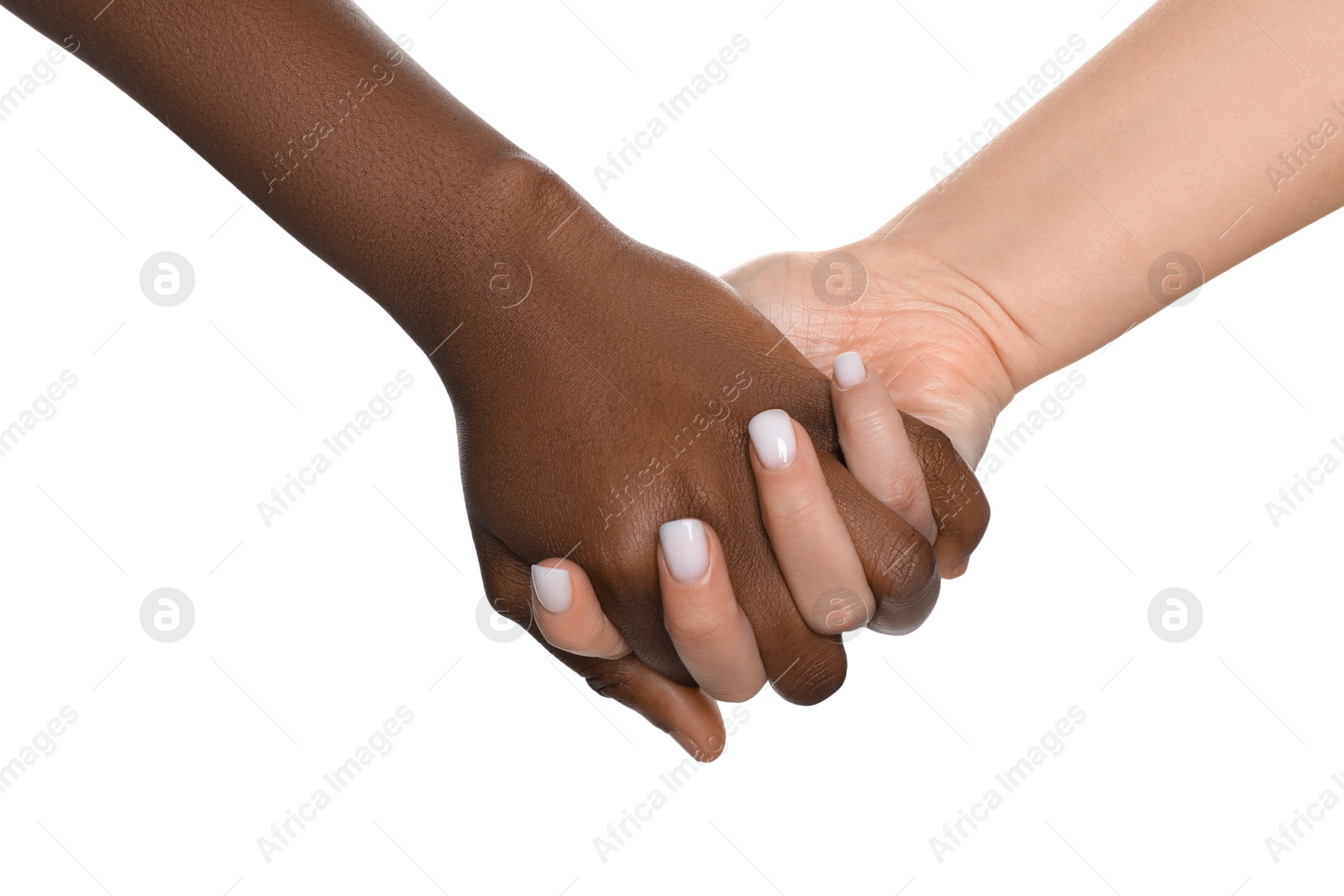 Photo of Stop racism. People of different skin colors holding hands on white background, closeup