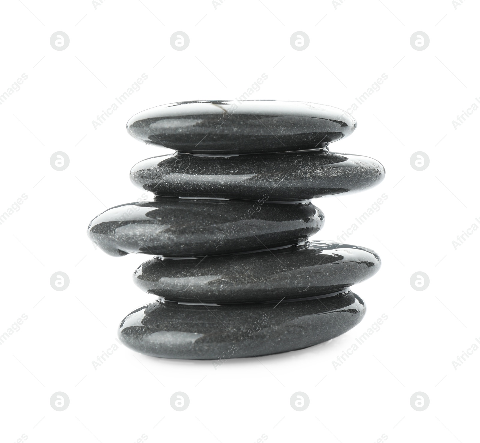 Photo of Stack of wet spa stones isolated on white