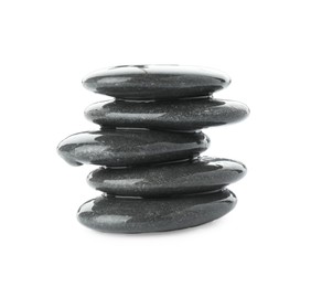 Photo of Stack of wet spa stones isolated on white