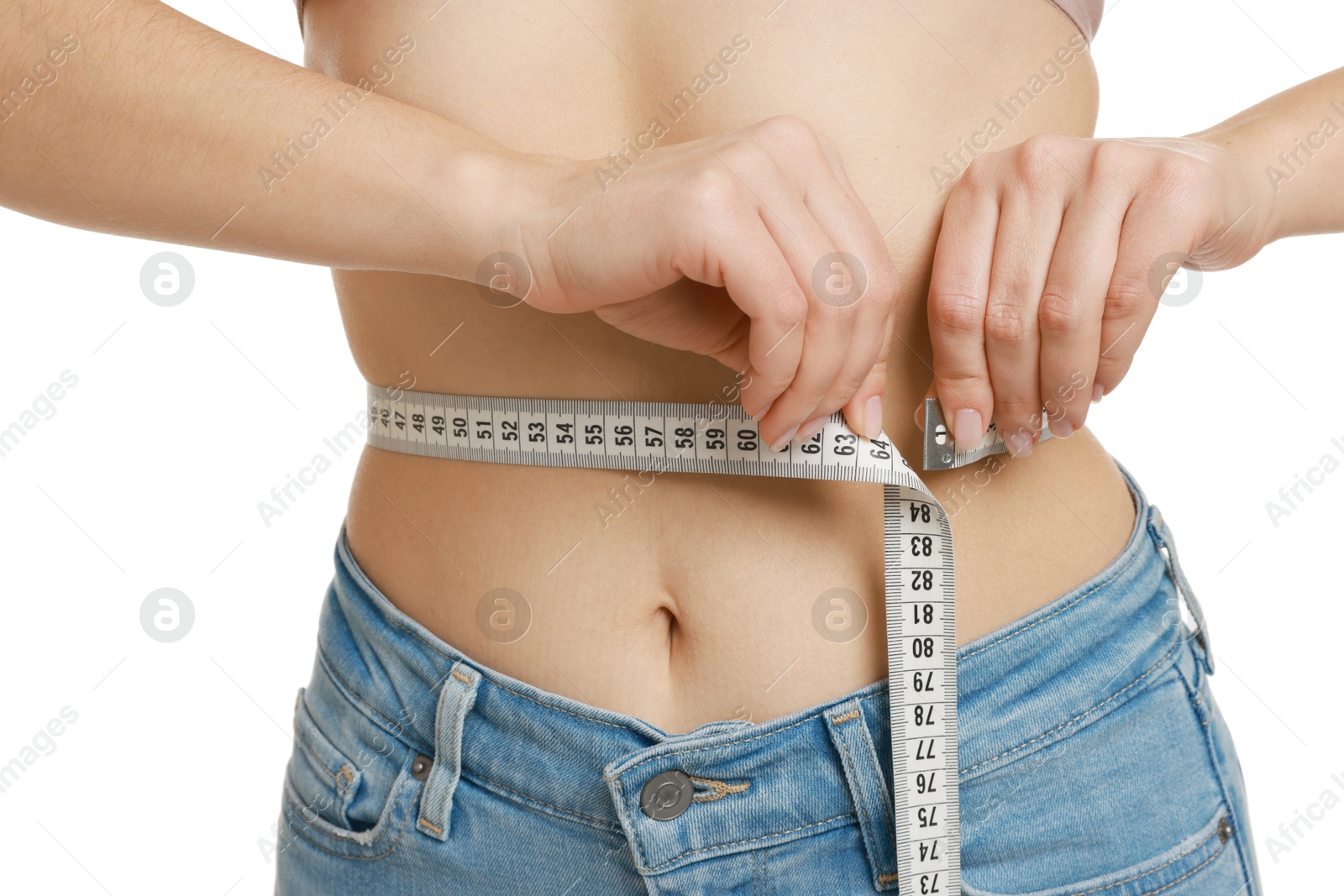 Photo of Woman measuring waist circumference on white background, closeup