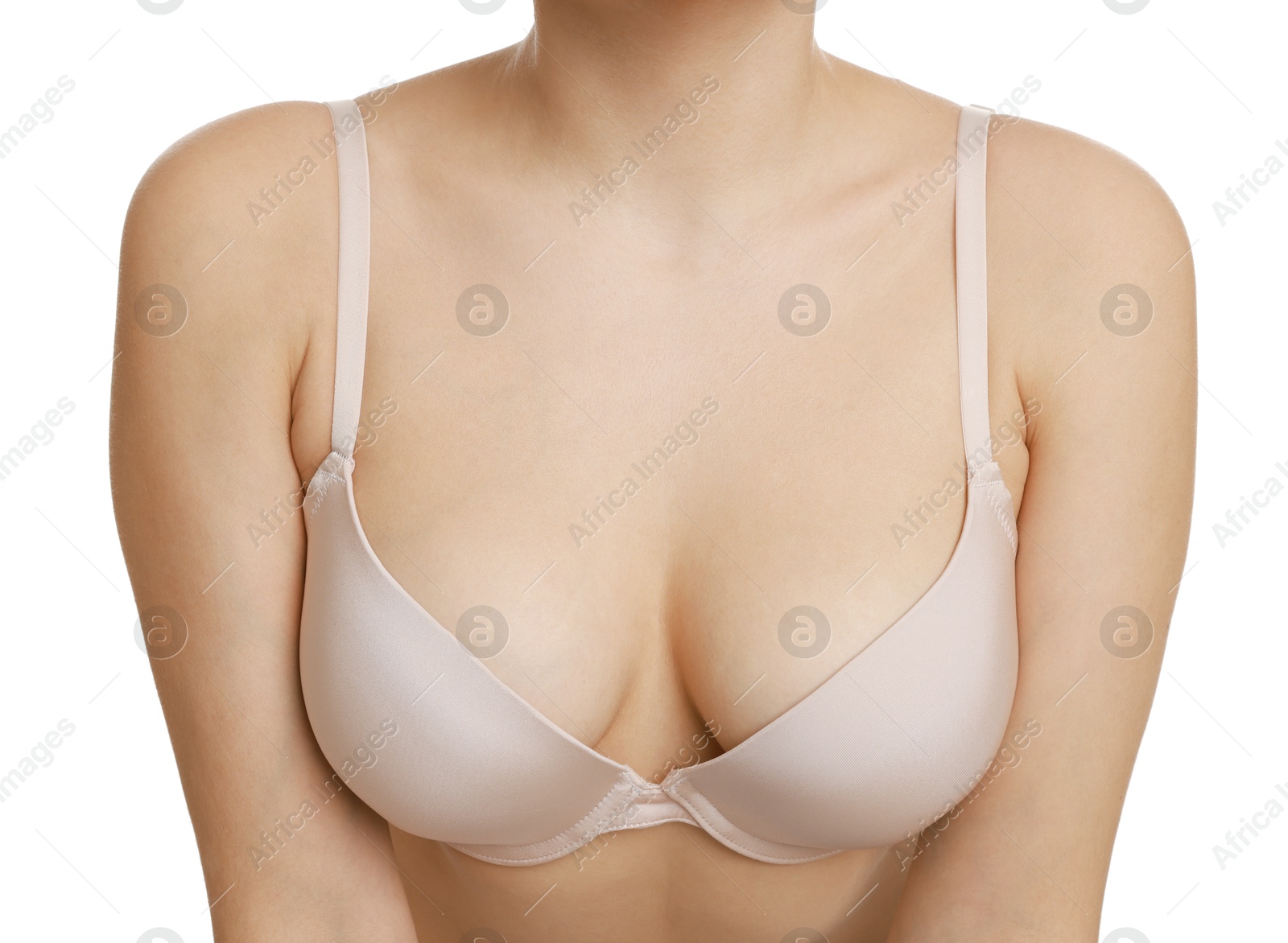 Photo of Woman wearing beautiful bra on white background, closeup