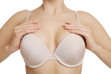 Photo of Woman wearing beautiful bra on white background, closeup