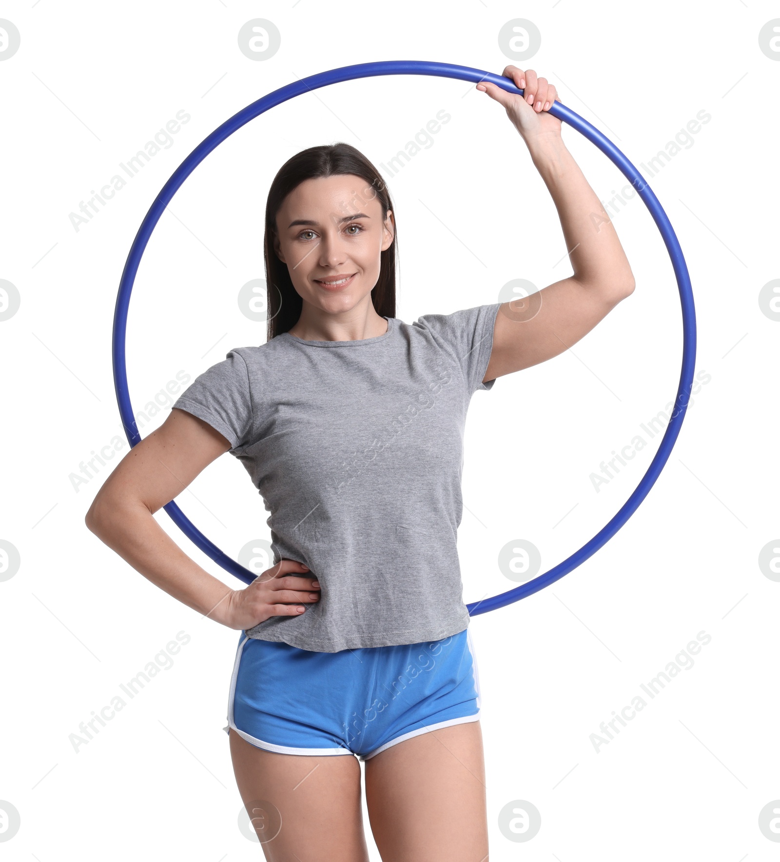 Photo of Smiling woman with hula hoop on white background