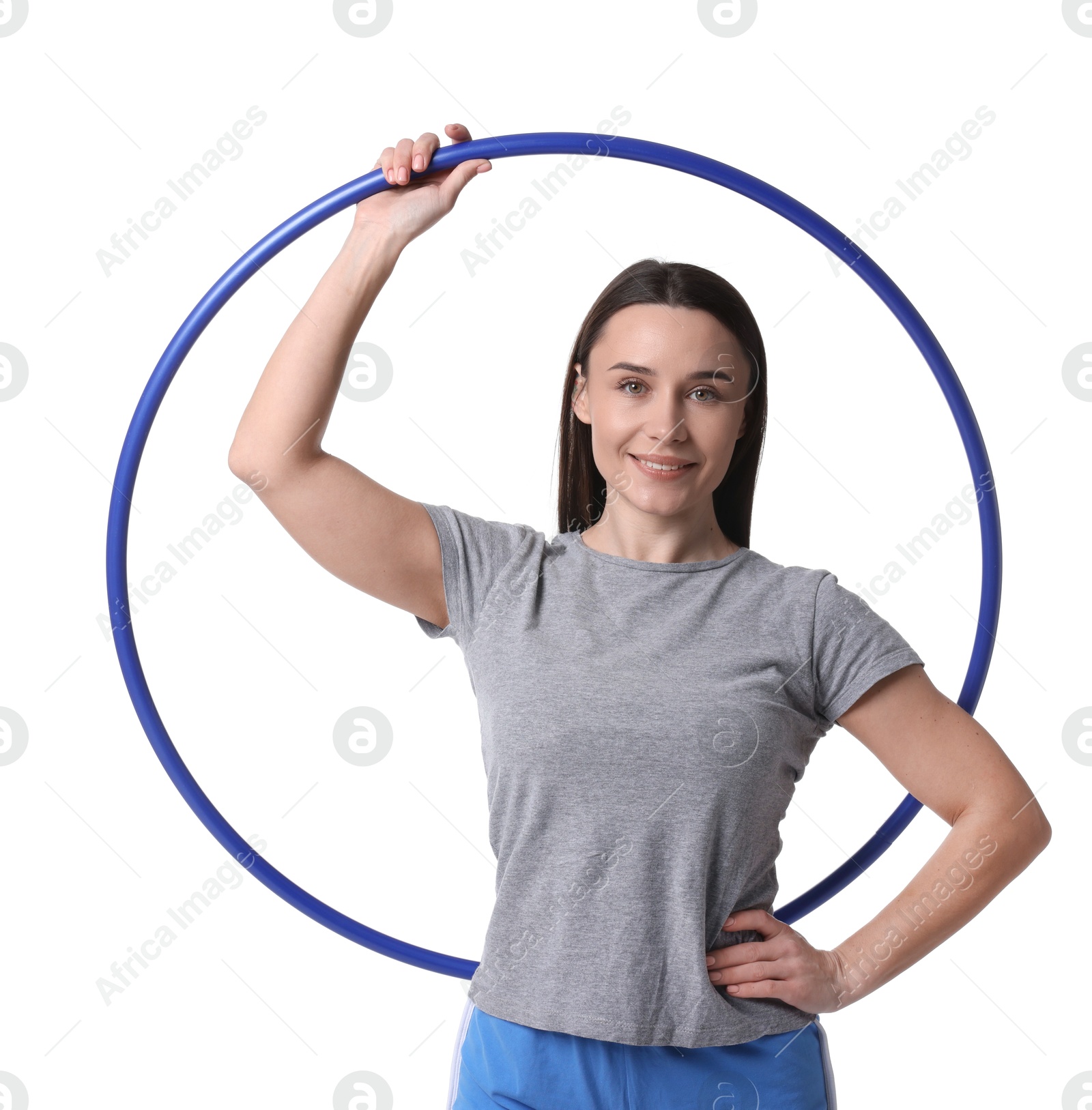 Photo of Smiling woman with hula hoop on white background