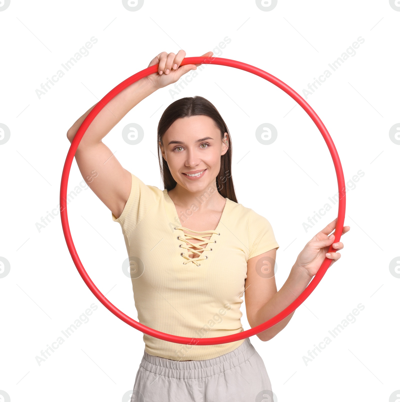 Photo of Smiling woman with hula hoop on white background