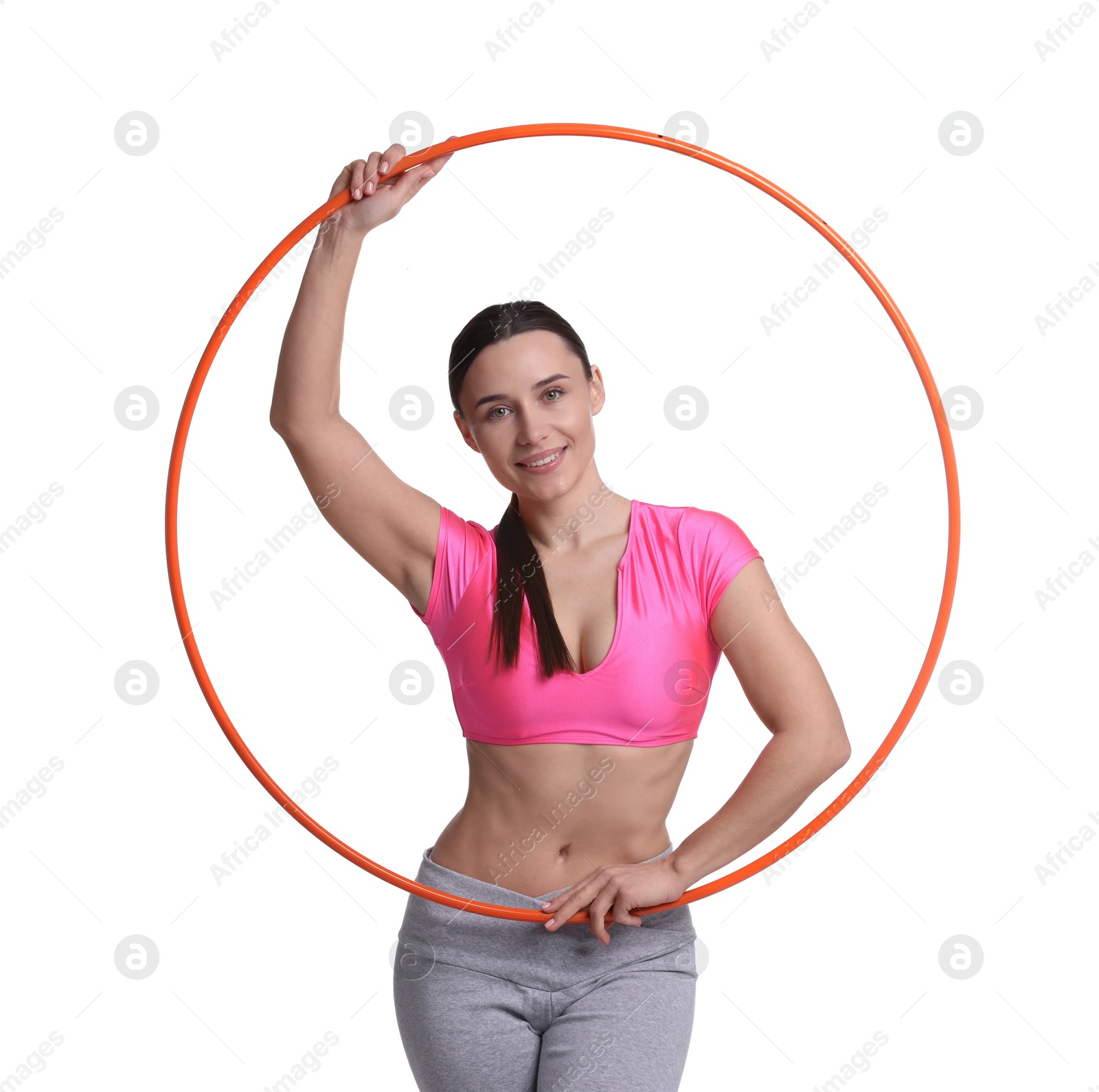 Photo of Smiling woman with hula hoop on white background